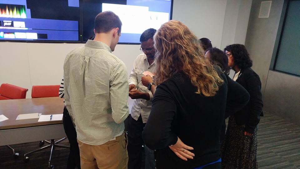 IBM Employees playing conference escape room